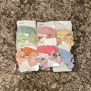 24 PIECES!! 
12 Sets Of Mint Vibrant Hair clips and 12 head bands